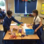 pupils buying items from the tuck shop